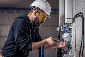 electrician working with electrical devices